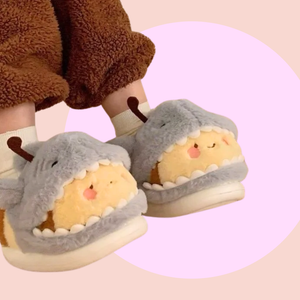 Bumble Shark Fluffy Slippers - fluffy 3D slippers with a yellow bumble bee wearing a cute shark onesie in context. This shows the front of the slippers and in scale of when it is worn.