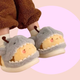 Bumble Shark Fluffy Slippers - fluffy 3D slippers with a yellow bumble bee wearing a cute shark onesie in context. This shows the front of the slippers and in scale of when it is worn.