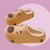 Caramel EVA slippers with Capybara design - lined with white plush inside. 