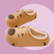 Caramel EVA slippers with Capybara design - lined with white plush inside. 