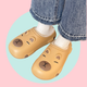 Caramel EVA slippers with Capybara design - lined with white plush inside. 
