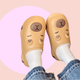 Caramel EVA slippers with Capybara design - lined with white plush inside. 