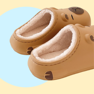 Caramel EVA slippers with Capybara design - lined with white plush inside. 