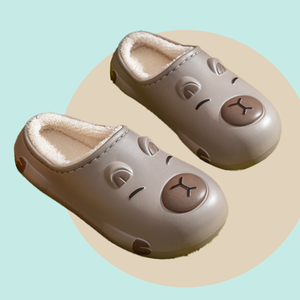 Dark Brown EVA slippers with Capybara design - lined with white plush inside. 