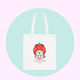 Tote bag with a cute cat in a strawberry design on a light blue circle background