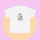 White t-shirt featuring a cute cartoon cat holding a coffee cup, with the slogan “No talkie before coffee.” Minimalist and kawaii design from The Linea Home Kitty Squad collection.