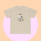 Beige t-shirt in a boba tea shade, featuring a kawaii cartoon cat holding a coffee cup and the slogan “No talkie before coffee.” Minimalist and playful, from The Linea Home Kitty Squad collection.