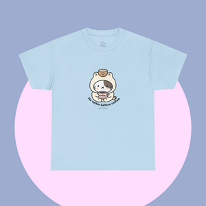 Light blue t-shirt with an adorable cartoon cat holding a coffee cup and the words “No talkie before coffee.” Minimalist, kawaii design, part of The Linea Home Kitty Squad.