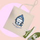 Cream tote bag featuring a kawaii kitty in a blue shark costume, playful slogan, and green trainers—perfect for everyday use. Tote bag